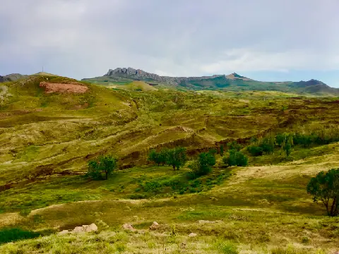 Boat-shaped Durupınar formation among brown hills in eastern Turkey.